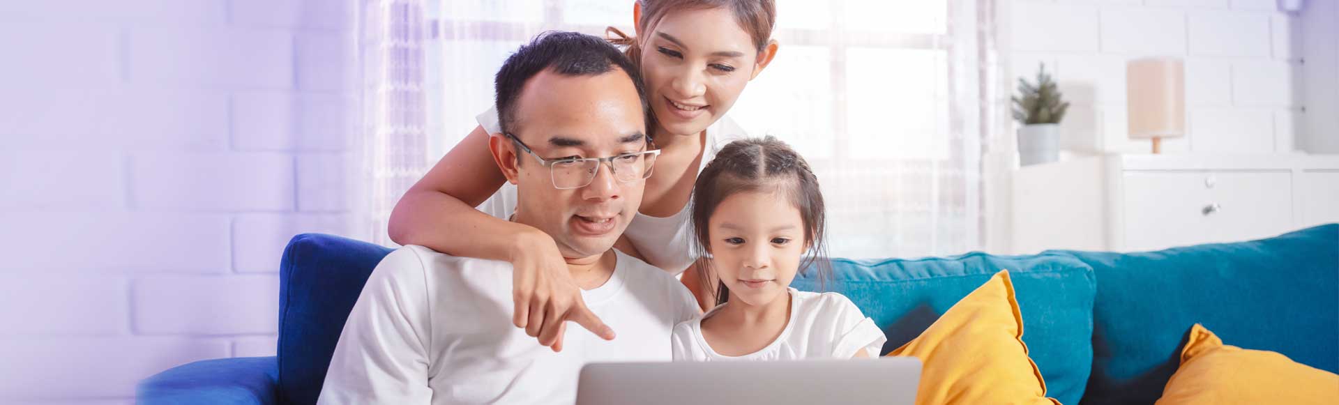 Family Using a Laptop