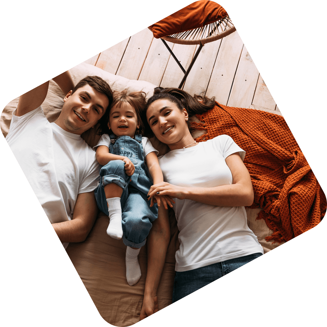 Family laying on a blanket